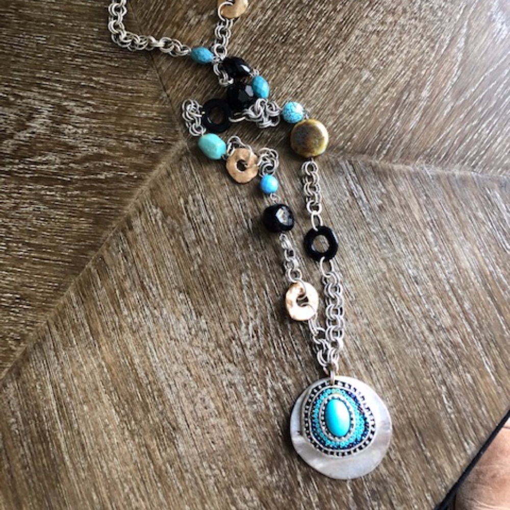 Long necklace with medallion